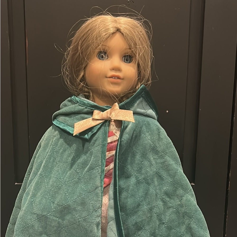 American Girl Doll wearing full dress and Cape with Bow